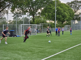 Laatste training S.K.N.W.K. JO11-1JM (partijtje tegen de ouders) van maandag 27 mei 2024 (84/137)